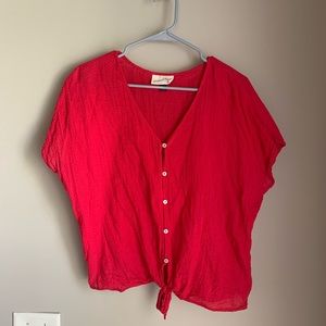 Gently used bright red Universal Threads causal top.